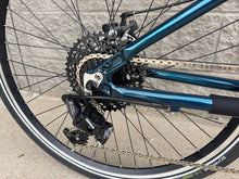 Load image into Gallery viewer, TEAL BLUE STREET, equipped with a JONES H BAR 2.5 Loop
